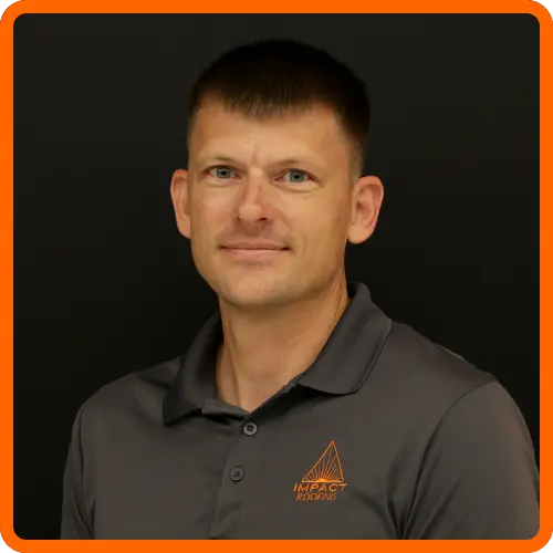 Jordan Lovell headshot wearing IMPACT branded gray polo