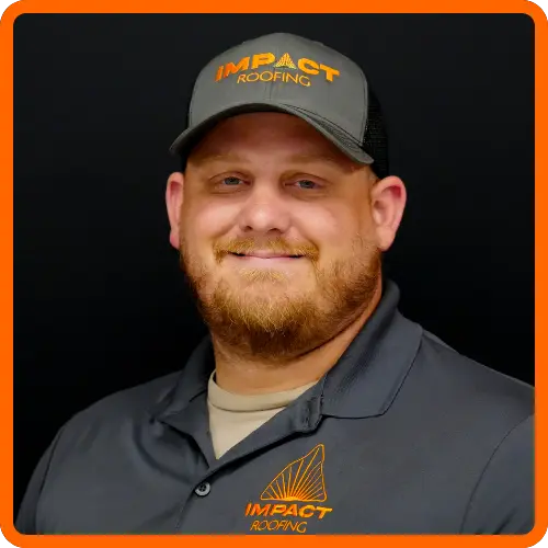 Scott Reed headshot wearing IMPACT branded cap and gray polo