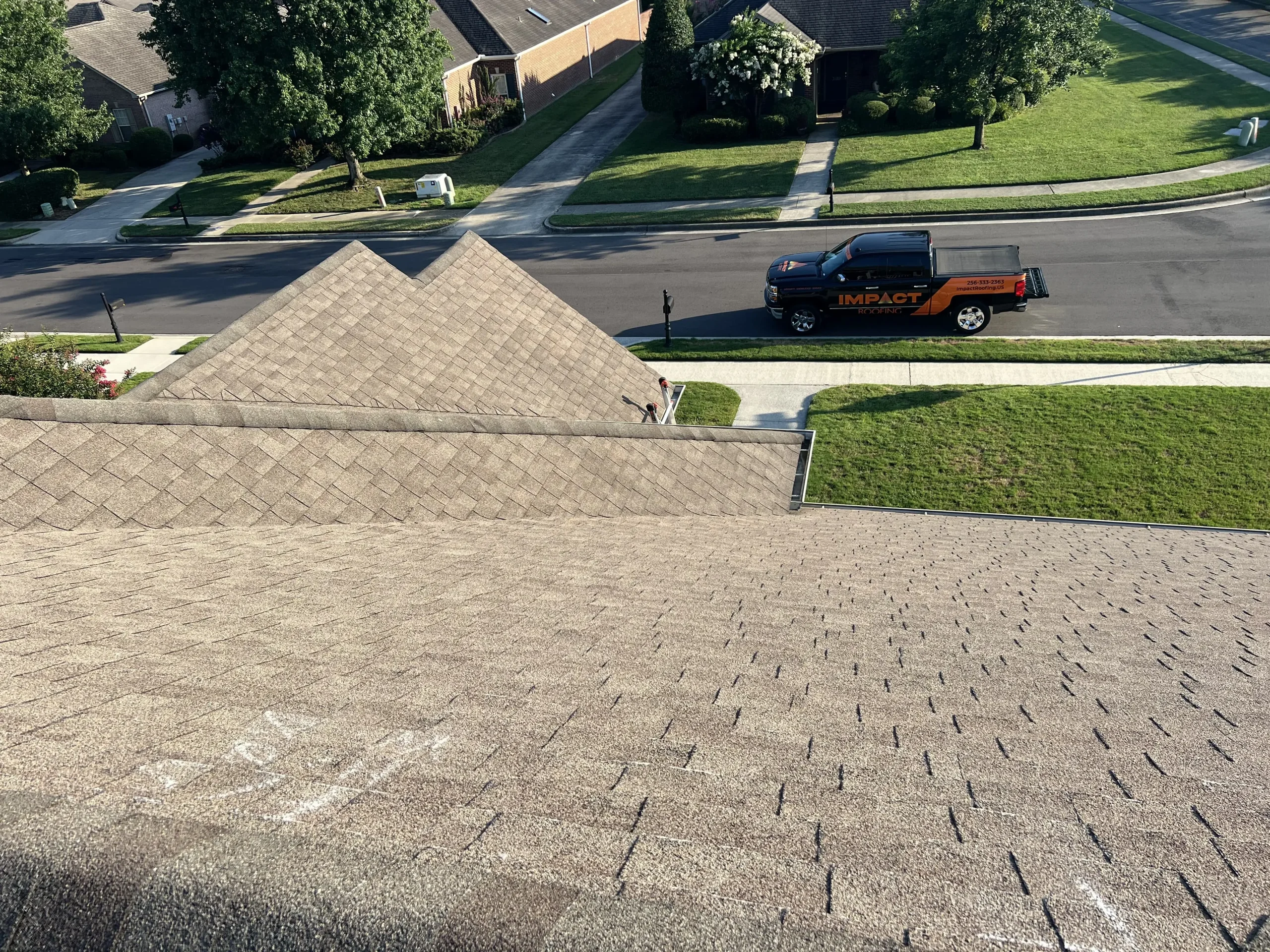 Close-up of IKO Dynasty Glacier shingle installation in Hampton Cove, AL