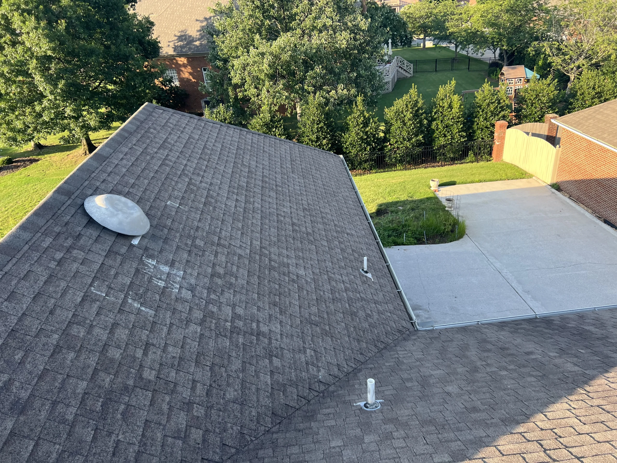 Roof replacement progress showing IKO Dynasty Glacier shingles in Hampton Cove, AL